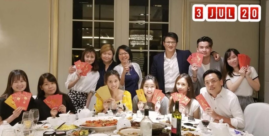 Moxie team celebrating with red packets